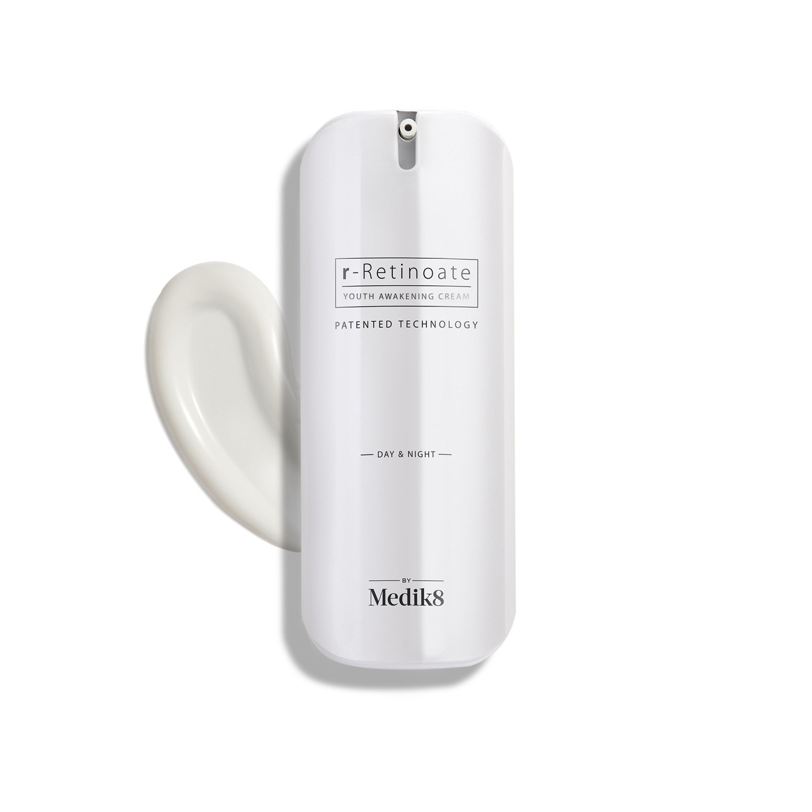 White pump bottle of Medik8 r-Retinoate Day and Night cream with a swatch of the cream behind it