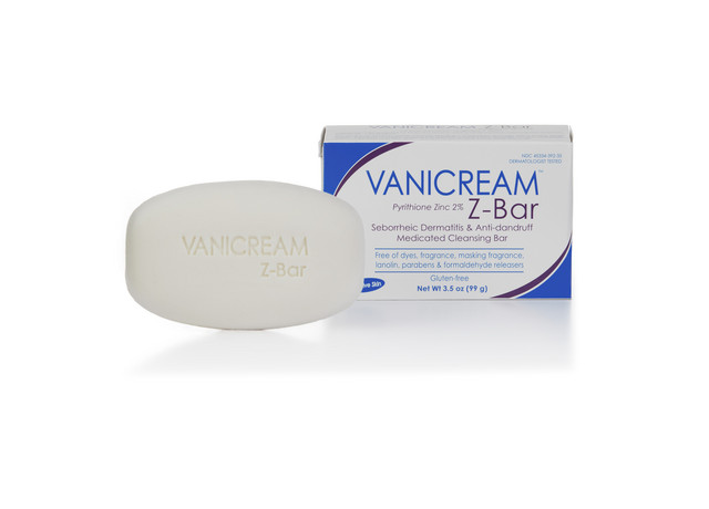 Vanicream Z Bar cleansing bar beside its 3.5 oz box, which prints Pyrithione Zinc 2 percent and the words Seborrheic Dermatitis and Anti dandruff Medicated Cleansing Bar in blue text.